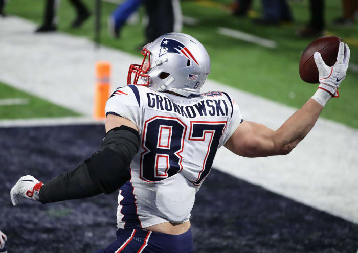 Rob Gronkowski spiking the ball.