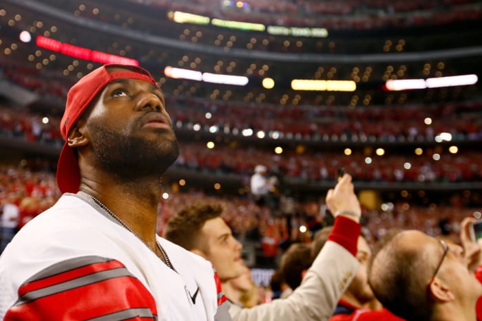 LeBron James roots on Ohio State in the championship game.