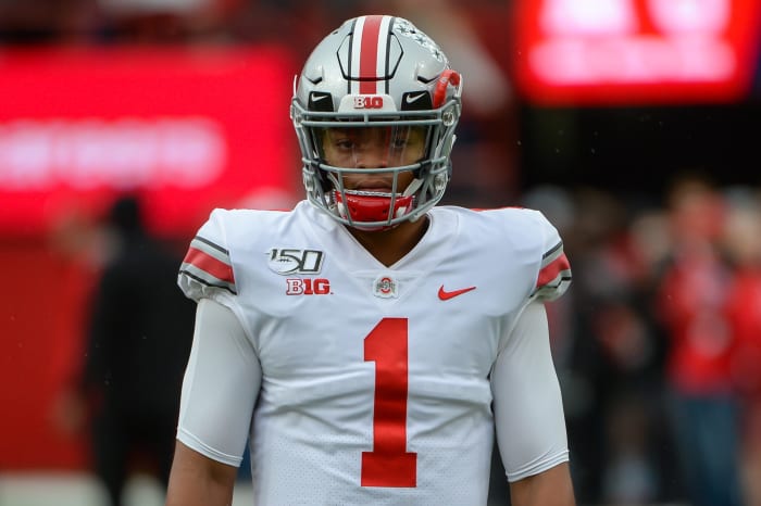 Justin Fields warms up before an Ohio State football game at Nebraska.