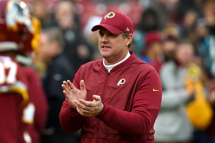 Redskins coach Jay Gruden clapping.