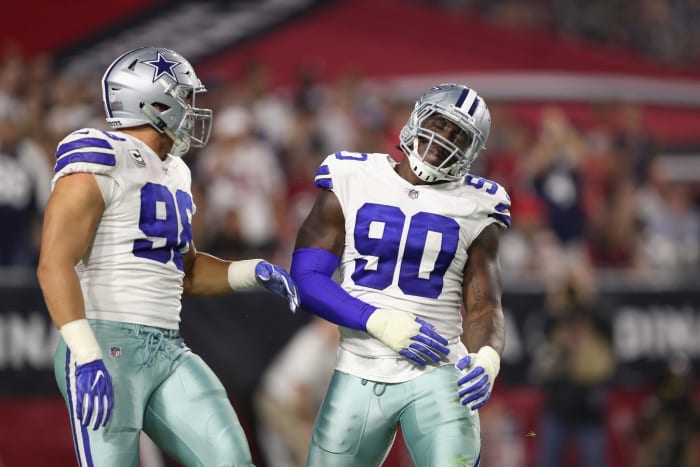 Demarcus Lawrence reacting after sacking the quarterback.