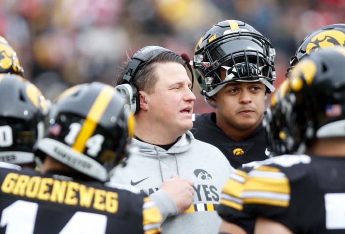 Iowa OC Brian Ferentz in a Hawkeyes huddle.