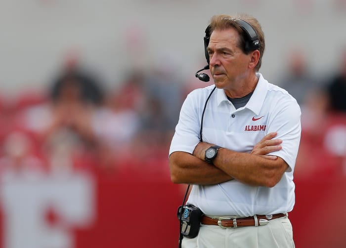 Nick Saban crossing his arms.