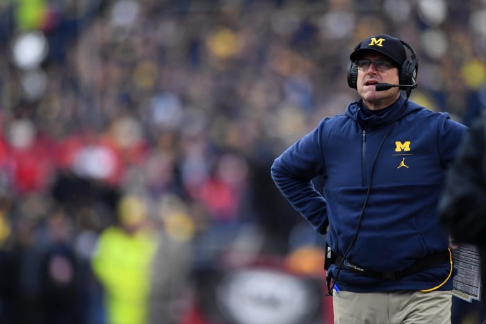 jim harbaugh on the sideline at the ohio state game