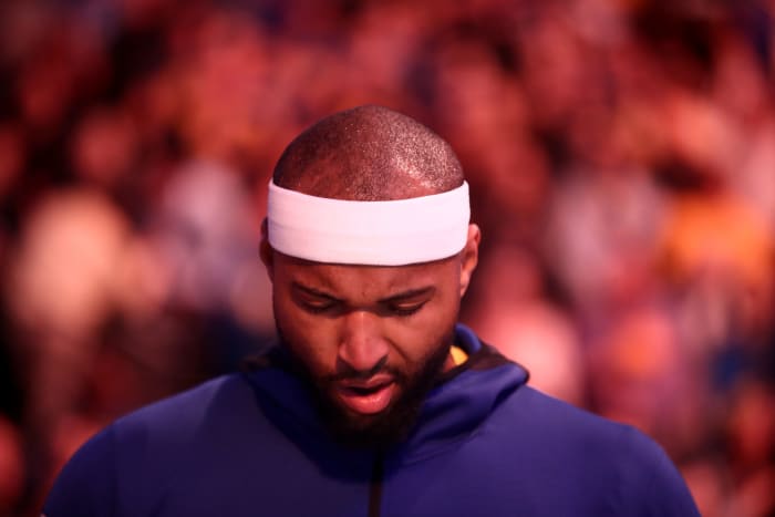 A closeup of DeMarcus Cousins during the National Anthem before a game.