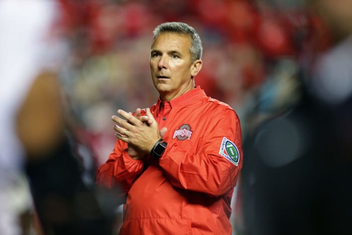 A closeup of Urban Meyer wearing an Ohio State jacket.