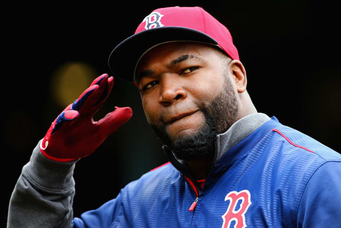 Boston Red Sox legend David Ortiz salutes fans.
