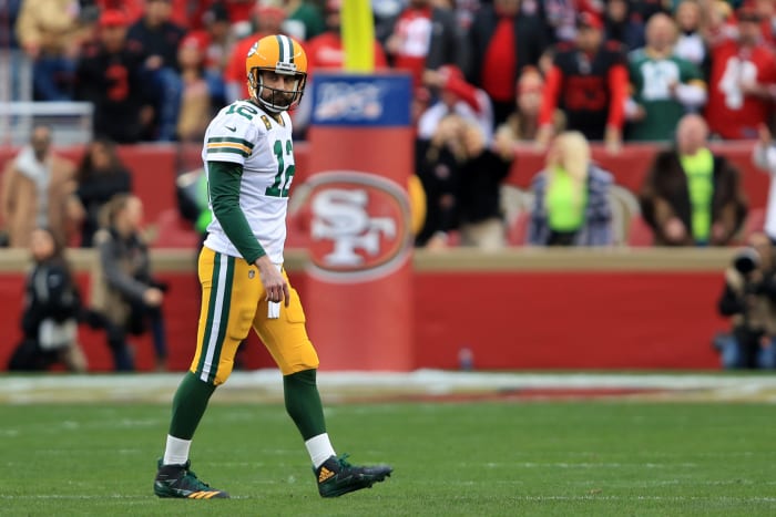 Aaron Rodgers walks off the field in San Francisco during NFC Championship Game.