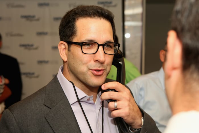 Adam Schefter on the phone.
