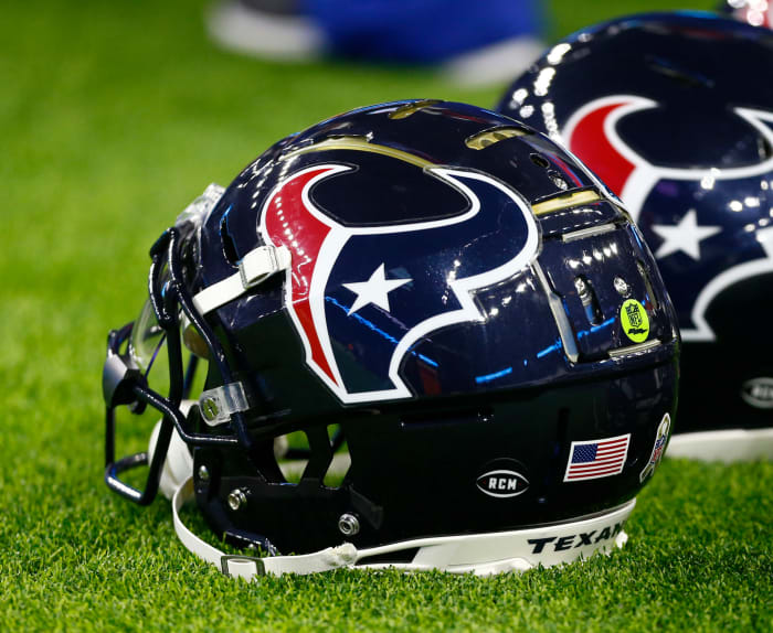 A closeup of a Houston Texans helmet.