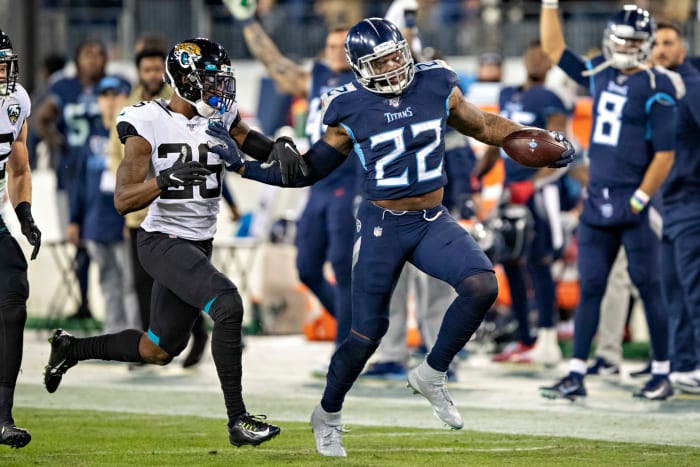 Derrick Henry runs the football for the Tennessee Titans.