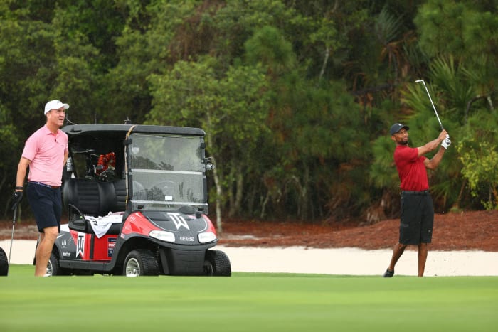 Peyton Manning and Tiger Woods at The Match.