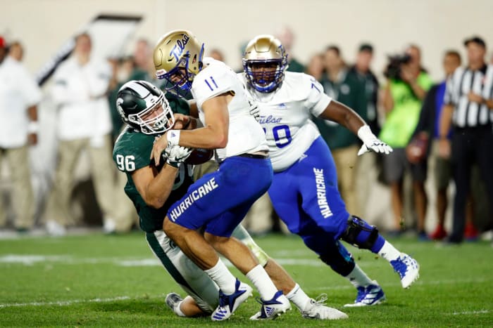 Michigan State lineman Jacub Panasiuk sacks a quarterback.