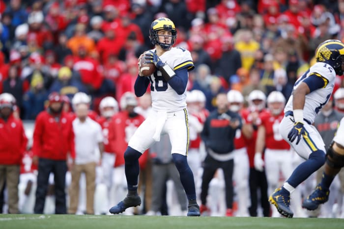 Michigan's Brandon Peters drops back to throw against Wisconsin.