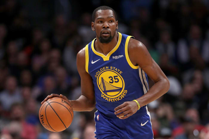 Kevin Durant dribbling the ball during a game.