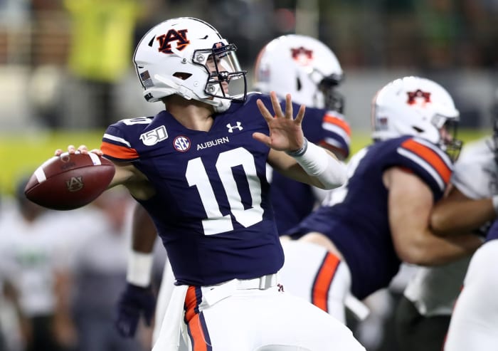 Auburn freshman quarterback Bo Nix throws a pass. during a college football game