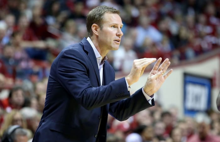 Fred Hoiberg gives instructions to his Nebraska basketball players.