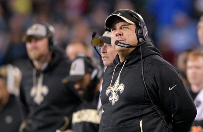 A closeup of New Orleans Saints coach Sean Payton wearing a black visor.
