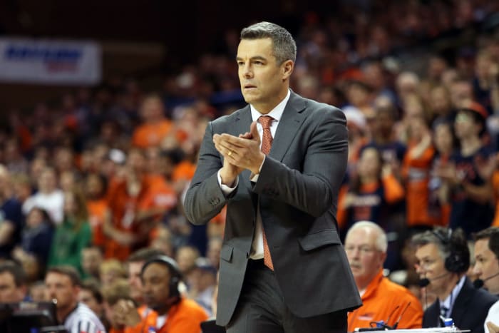 A closeup of Virgina head coach Tony Bennett clapping.