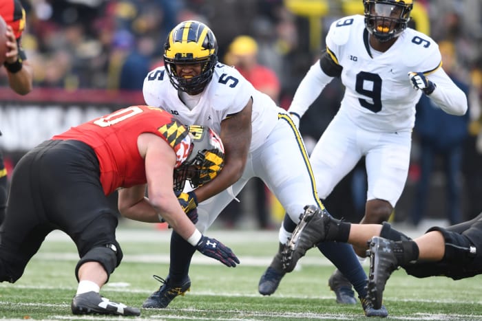 Aubrey Solomon takes on a Maryland player.