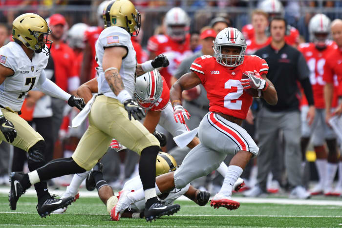 J.K Dobbins running the ball for Ohio State.