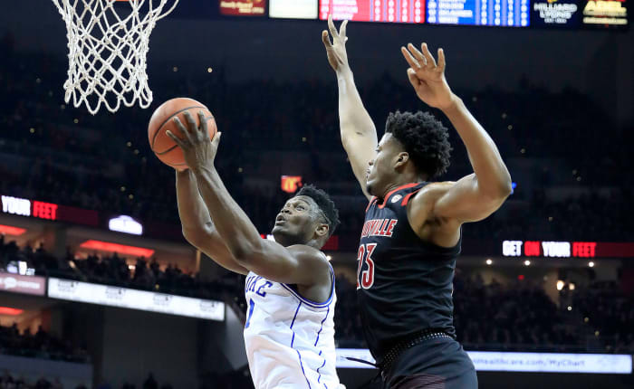 LOUISVILLE, KENTUCKY - FEBRUARY 12: Zion Williamson #1 of the Duke Blue Devils shoots the ball against the Louisville Cardinals at KFC YUM! Center on February 12, 2019 in Louisville, Kentucky. (Photo by Andy Lyons/Getty Images)