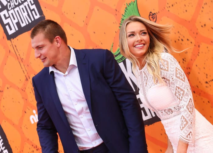 Rob Gronkowski and his girlfriend Camille Kostek walk the red carpet.