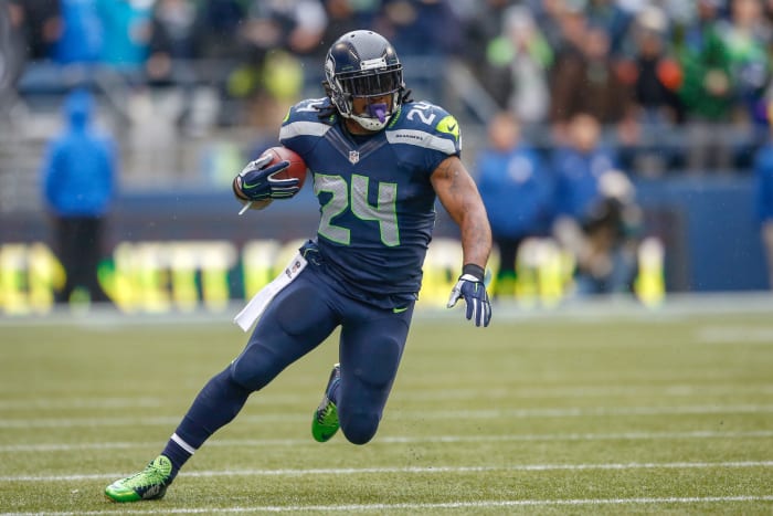 Marshawn Lynch running the ball for the Seattle Seahawks.