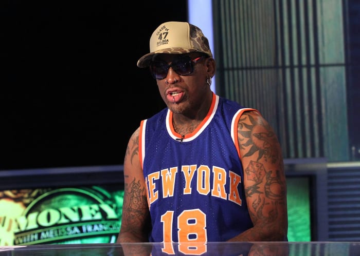 Dennis Rodman wearing a Knicks jersey.