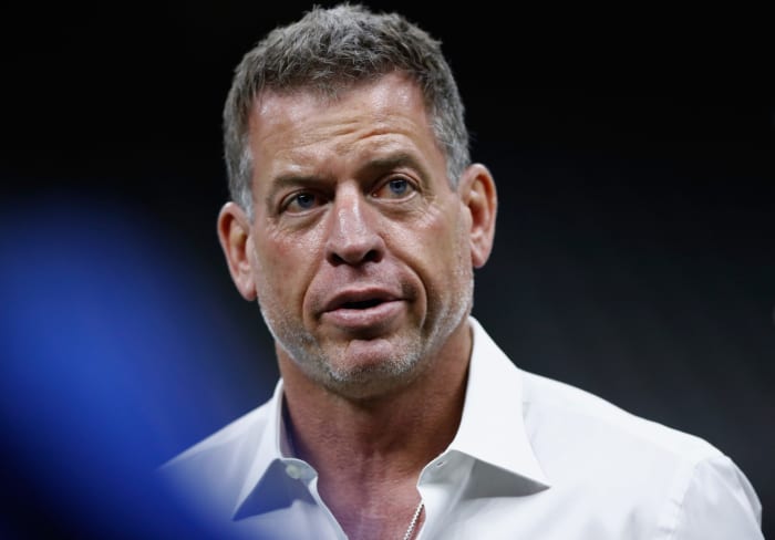 fox NFL analyst troy aikman down on the field