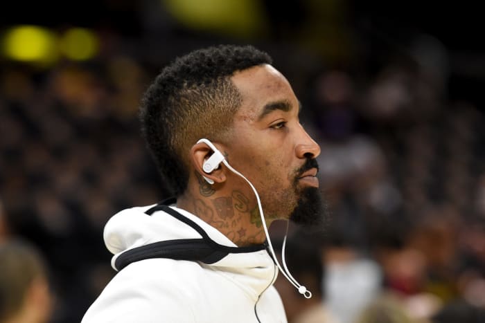 A closeup of J.R. Smith wearing headphones.