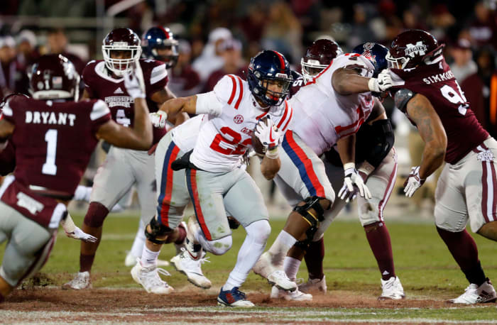 Ole Miss running back Jordan Wilkins runs the ball against Mississippi State.