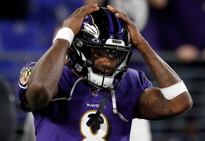 Baltimore Ravens quarterback Lamar Jackson is stunned by an interception against the Titans.