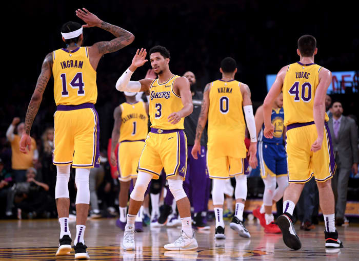 Brandon Ingram and Josh Hart high five during Lakers vs. Warriors.