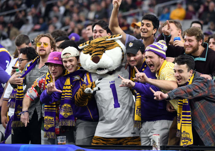 LSU's mascot celebrating with fans.