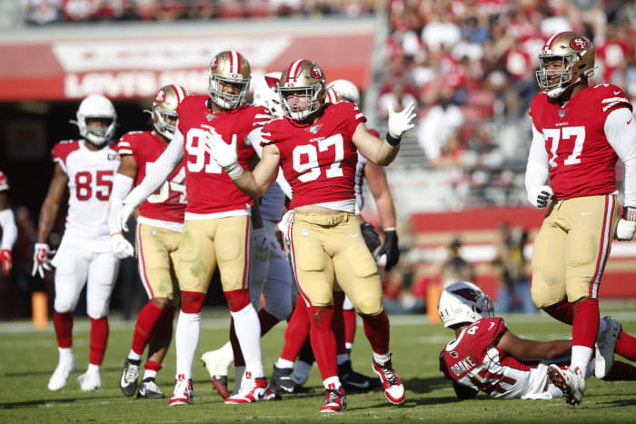 Nick Bosa celebrates a tackle during 49ers-Cardinals game.