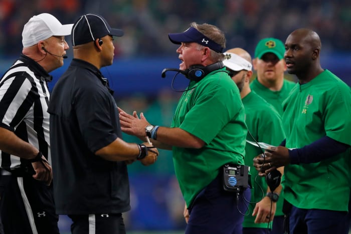 Brian Kelly of Notre Dame argues with the officials.