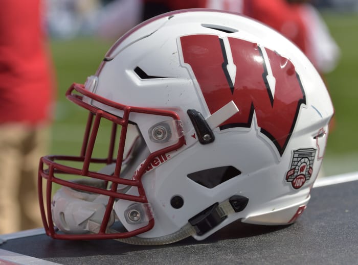 A closeup of a Wisconsin Badgers football helmet.