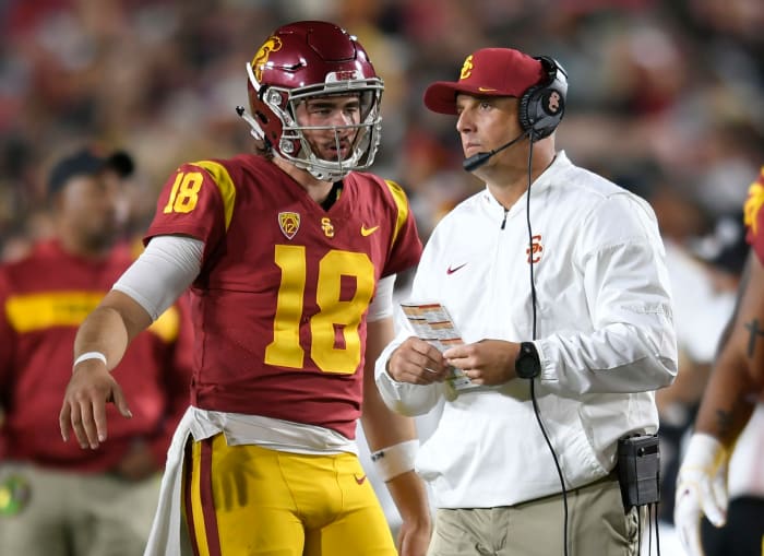 JT Daniels talking to USC head coach Clay Helton.