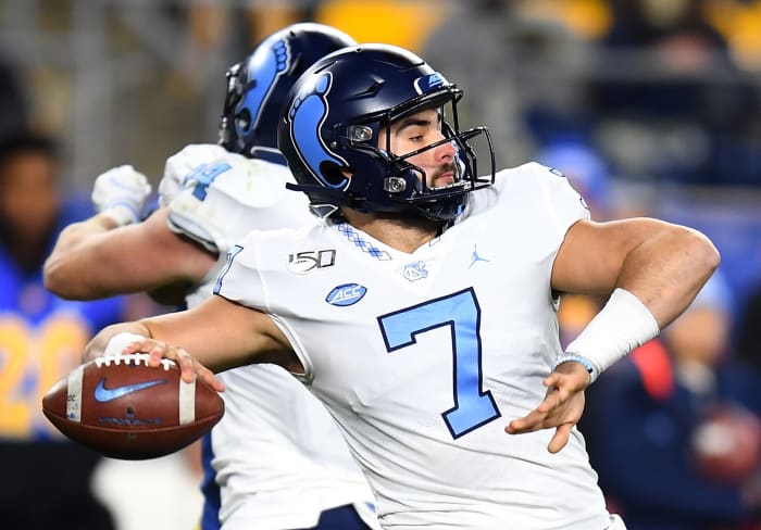 UNC quarterback Sam Howell throws a pass.