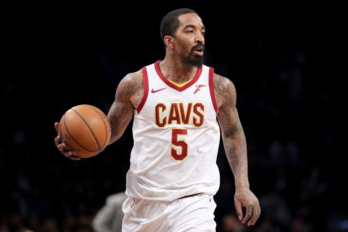 J.R. Smith dribbling the ball.