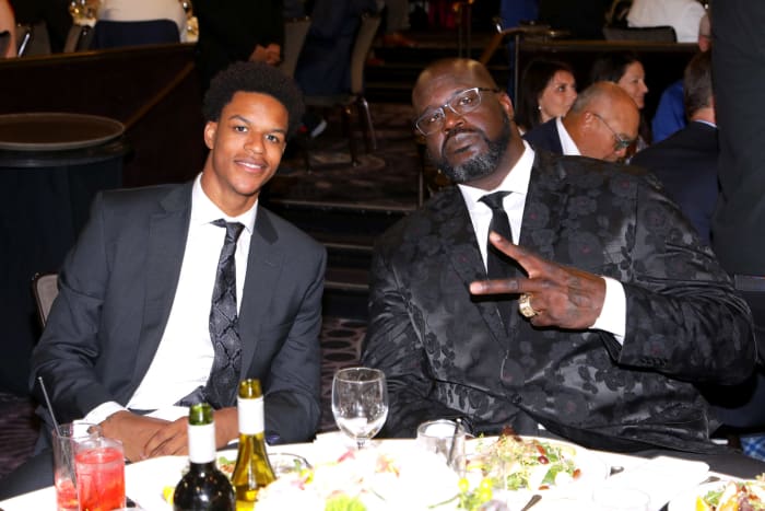 Shareef O'Neal and his father Shaq at a dinner.