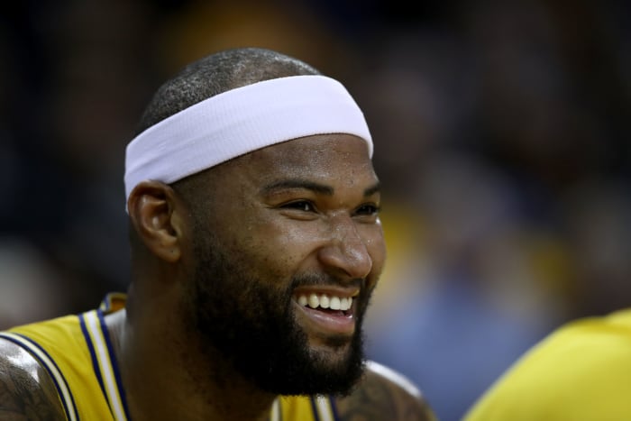 A closeup of DeMarcus Cousins laughing during a game.