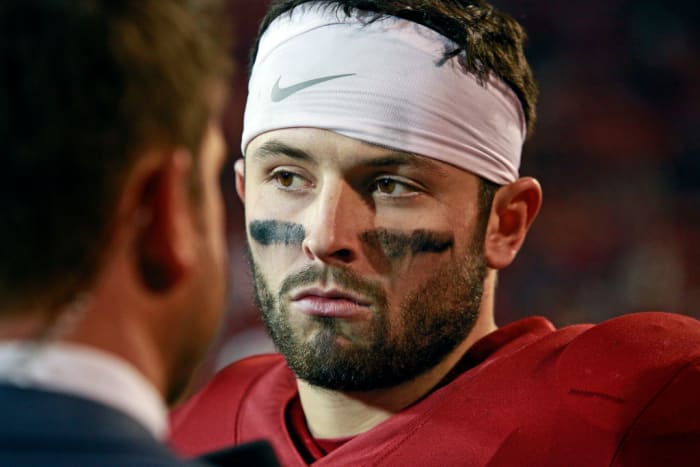 A closeup of Baker Mayfield wearing a white headband.