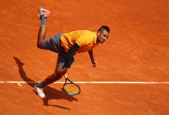 Nick Kyrgios serves in the italian open