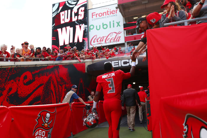 Jameis Winston walking off the field.