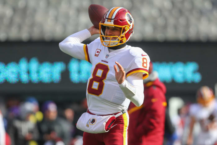 Kirk Cousins throwing a pass.