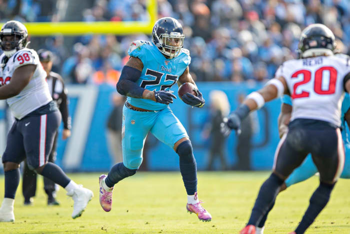 Derrick Henry runs the football for the Tennessee Titans.