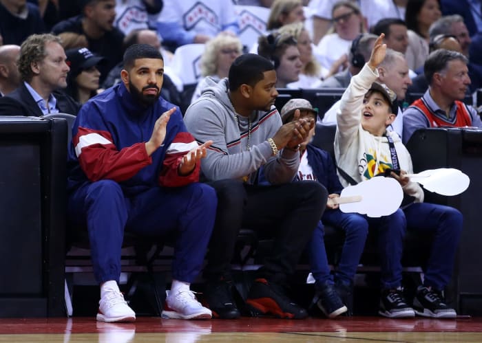 Drake watches Raptors vs. Cavaliers from courtside.