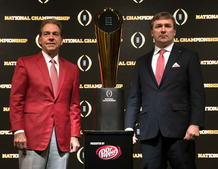 SEC coaches Nick Saban and Kirby Smart, with the College Football Playoff trophy.